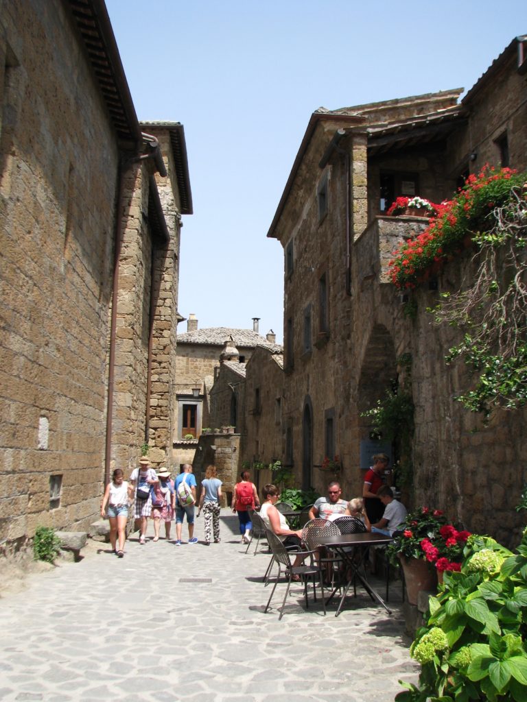 Tourists hanging out in one of the cafes in Civita di Bagnoregio