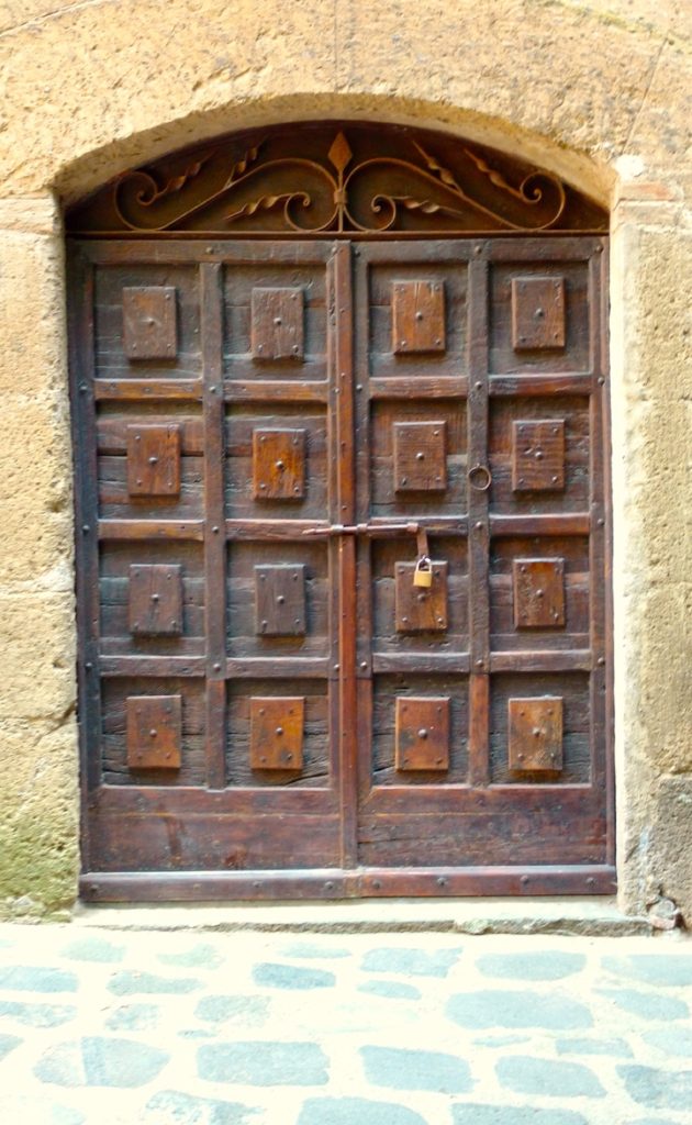 Civita di Bagnoregio - wooden door to one of the buildings