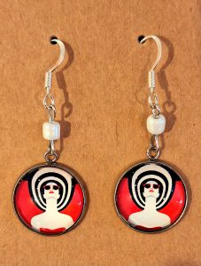 Funky lady dressed for the beach dangle earrings are a whimsical addition to any bohemian jewelry box. Perfect birthday or Christmas gift for that friend who is into Patrick Nagel. Check out all my listings on https://ninemusesartworks.etsy.com Follow me on Instagram at https://www.instagram.com/NineMusesArtworks/ , on Pinterest at https://www.pinterest.com/NineMusesArtworks/ , and on Facebook at https://www.facebook.com/NineMusesArtworks #funkyearrings #bohoearrings #patricnagel #nagel #funkylady